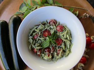 ZUCCHINI NOODLES WITH BASIL PESTO AND CHERRY TOMATOES