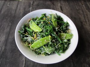 KALE, BROCCOLI and SNOWPEA SALAD WITH TAHINI DRESSING